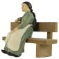 Mobile Preview: Handbemalte Krippenfigur Großmutter sitzend inkl. Bank, ca. 8 cm, K 925