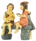 Preview: Handbemalte Krippenfigur Kinder auf einer Bank, ca. 7 cm, K 134-3