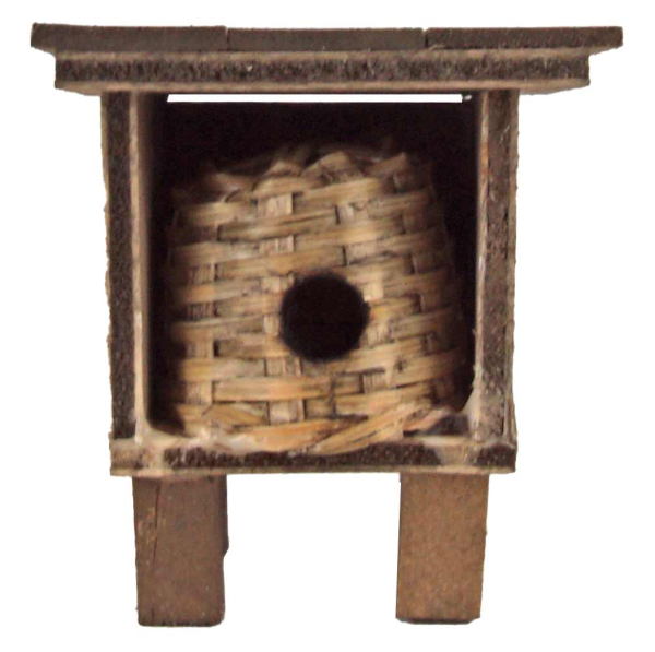 Ein kleines Bienenhaus voller Wärme – ein stimmungsvolles Detail für deine Weihnachtskrippe