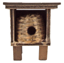 Ein kleines Bienenhaus voller Wärme – ein stimmungsvolles Detail für deine Weihnachtskrippe